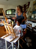 Claudio painting with his Nana